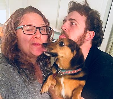 Heather, her husband Bob, and their dog Pickle pose together for a selfie.